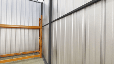 Walkthrough of a move-in ready WorkHub Flex suite with storage shelving and office area