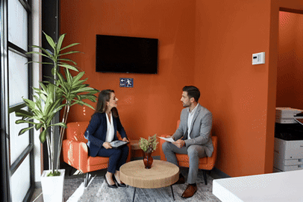 Business meeting in a WorkHub Flex lounge area